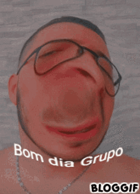 a man wearing glasses and a necklace has the words bom dia grupo written on his face