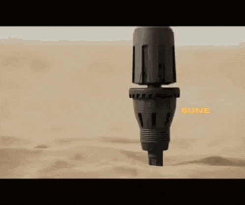 a blurred image of a person walking in the desert with the words early 2025 and sune on the bottom