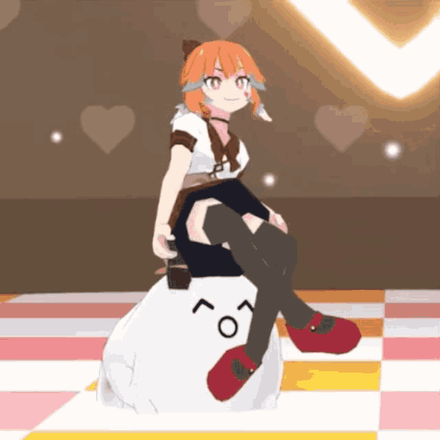 a girl is sitting on a white object with a smiley face on it