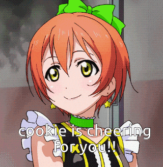 a girl with a green bow on her head and the words " cookie is cheering for you "