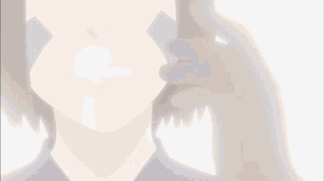 a close up of a person 's face with a purple object on it