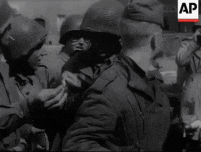 a group of soldiers are gathered in a black and white photo with the ap logo in the corner