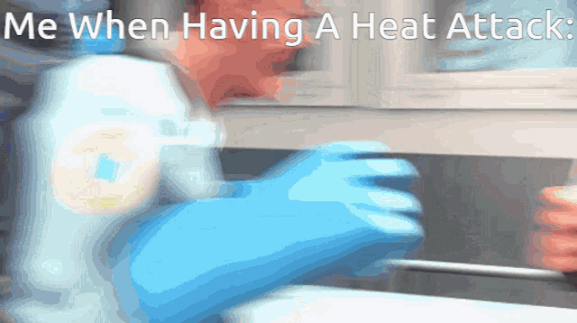 a person wearing blue gloves is cleaning a sink with the words me when having a heat attack on the bottom