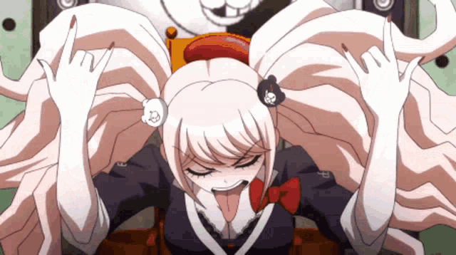 a girl with long hair is making a funny face