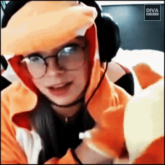 a woman wearing headphones and a diva mobile logo