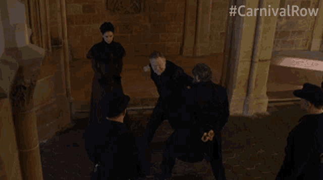 a group of people are standing in a room with the hashtag #carnivalrow on the bottom