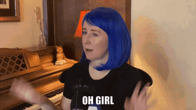 a woman with blue hair and a black shirt says oh girl