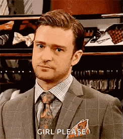 a man in a suit and tie is standing in front of a closet and asking for a girl .