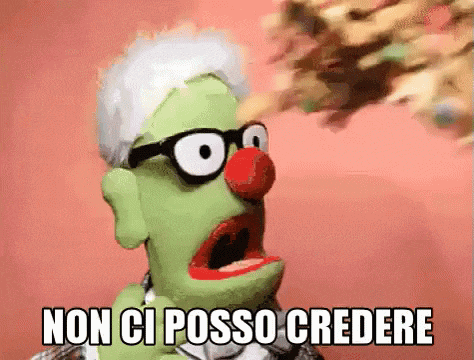 a green puppet with glasses and a red nose says non ci posso credere .