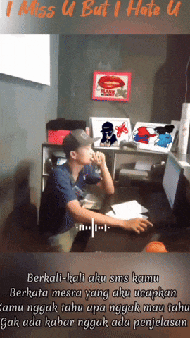 a man sits at a desk in front of a computer with the words " i miss u but i hate u " at the top