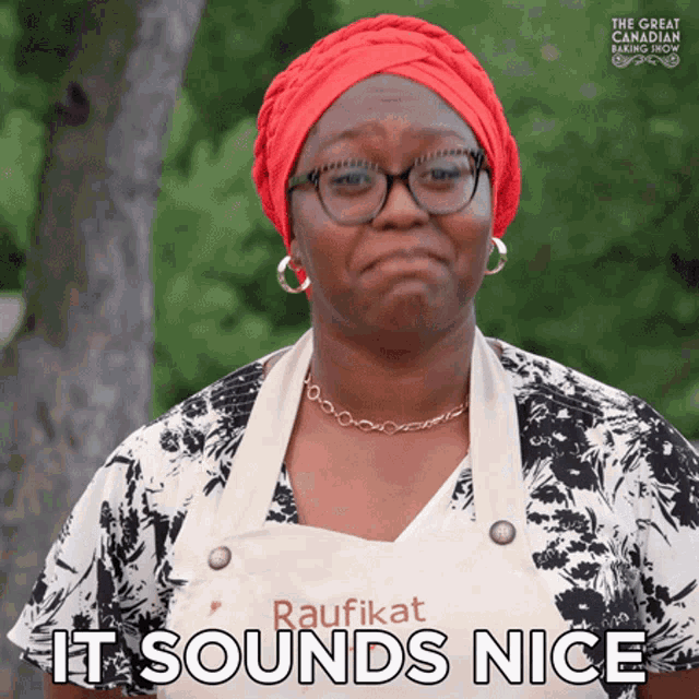 a woman wearing an apron that says raufikat it sounds nice