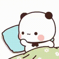 a cartoon panda bear is laying in bed with a pillow and giving a thumbs up .