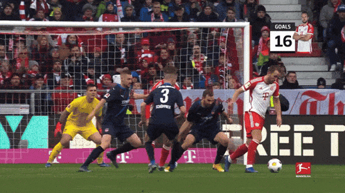 a soccer player with the number 3 on his jersey kicks a ball
