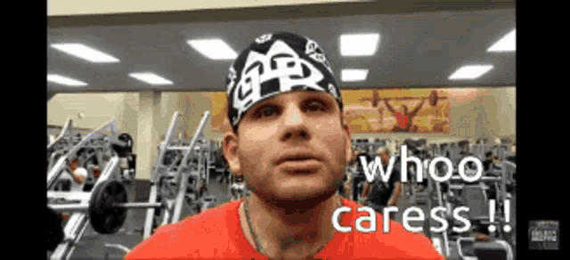 a man wearing a bandana says whoo caress