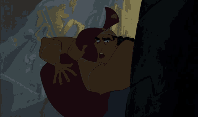 a cartoon character with a crown on his head is standing next to a wall