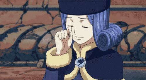 a girl with blue hair and a fairy tail necklace