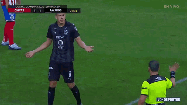 a soccer player with the number 3 on his jersey stands on a field