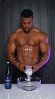 a man without a shirt is pouring something into a bowl with the time of 5:46 am