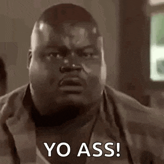 a close up of a man 's face with the words yo ass written on it .