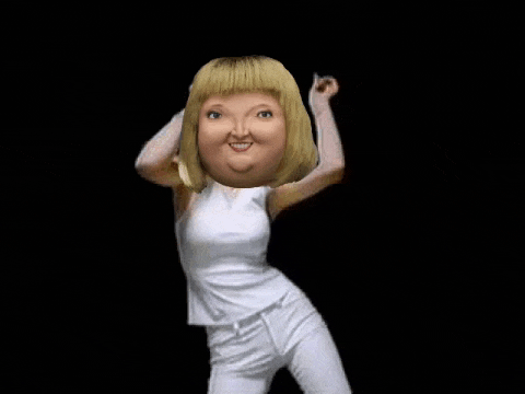 a woman in a white shirt and white pants is dancing with a cartoon face on her head .