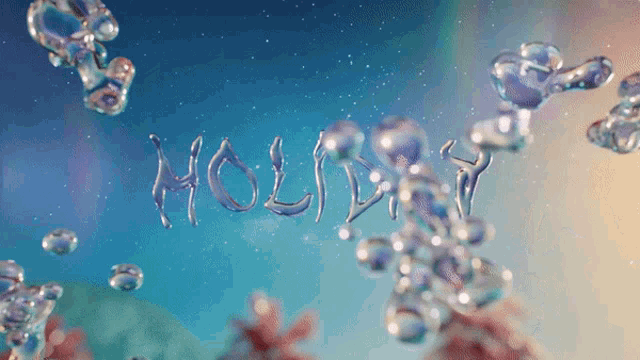 the word holiday is written in water bubbles on a blue background