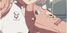 a close up of a girl wearing a pink jacket with spikes