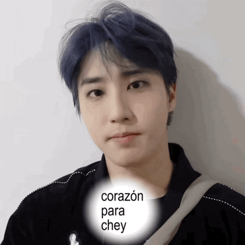 a close up of a person 's face with the words corazon para chey written on it