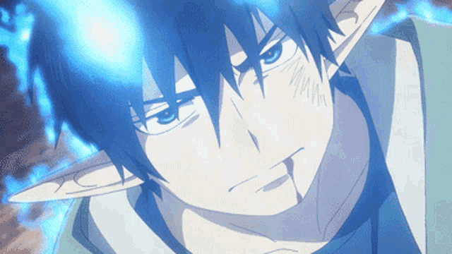 a close up of a person with blue hair