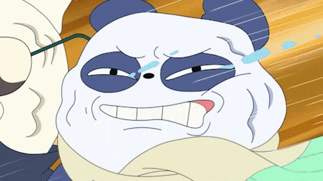 a panda bear with a scarf around his neck is crying