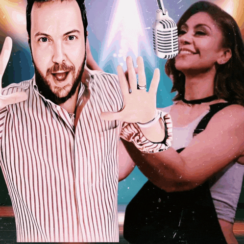 a man and a woman are posing for a photo with a microphone in the background