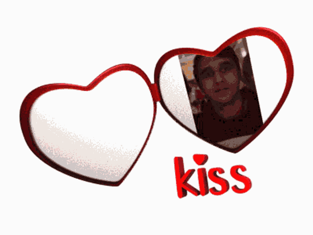 a picture of a man in a heart shaped frame with the word kiss on the bottom