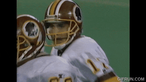 a football player wearing a helmet that says washington redskins