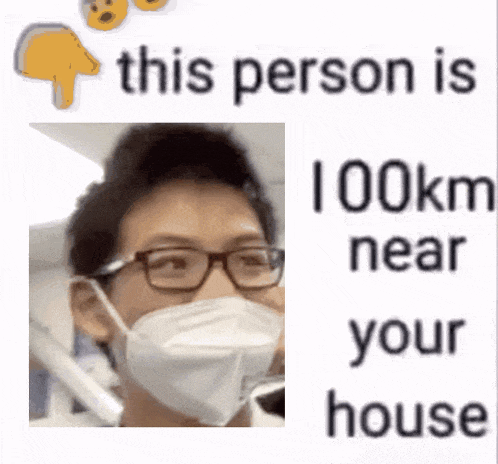 a man wearing a mask and glasses is standing next to a sign that says this person is 100km near your house .