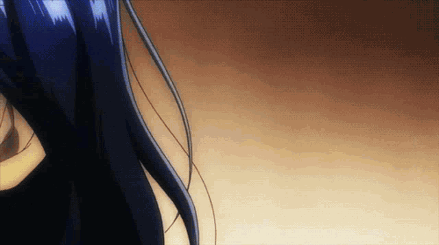 a close up of a person 's face with long blue hair