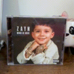 a cd case with a picture of a young boy on it