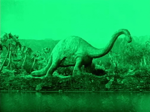 Green Dinosaur GIF - Green Dinosaur Eating GIFs