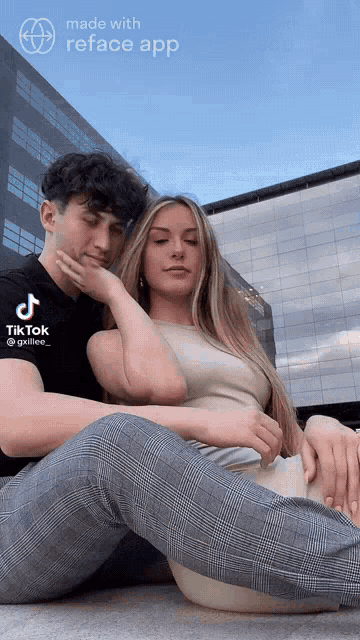 a man and a woman are sitting next to each other with a tik tok app on the bottom