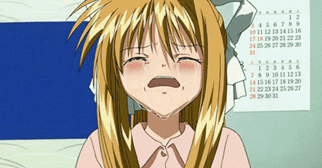a girl is crying in front of a calendar that shows the month of january