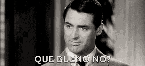 a black and white photo of a man in a suit and tie asking a question .