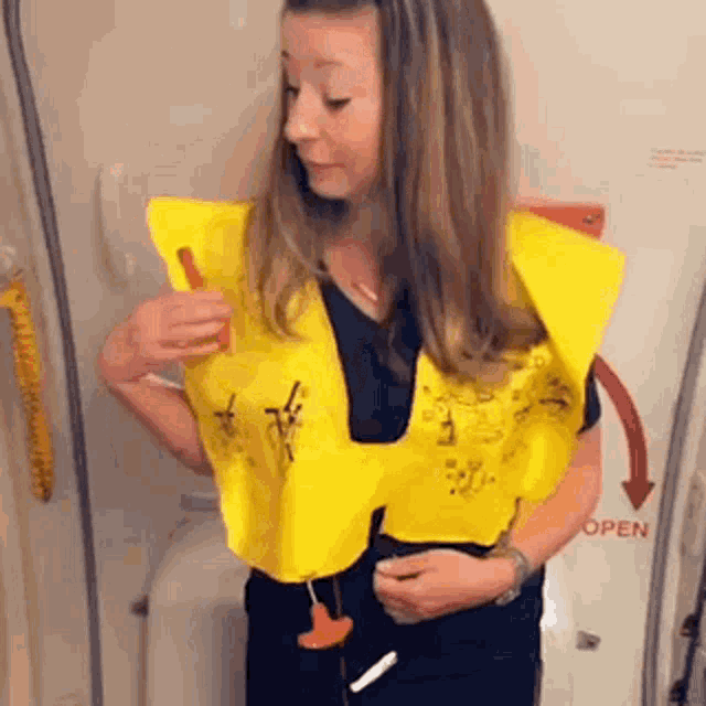 Life Vest Colleen Blows GIF - Life Vest Colleen Blows Blow GIFs