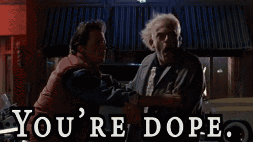 two men shaking hands with the words " you 're dope " behind them