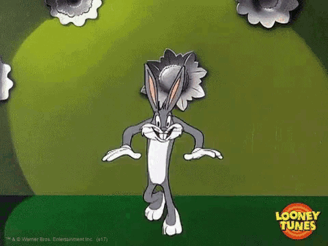 bugs bunny from the looney tunes cartoon is dancing in front of a green background .