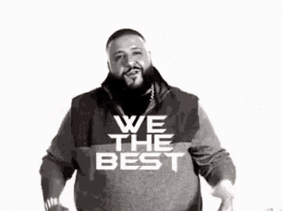 a black and white photo of a man with a beard giving the middle finger .
