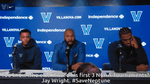 three men are sitting at a table with microphones in front of a wall that says independence on it
