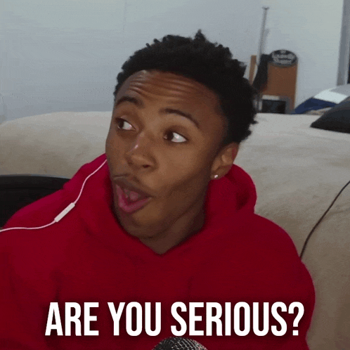 a young man wearing a red hoodie is asking are you serious