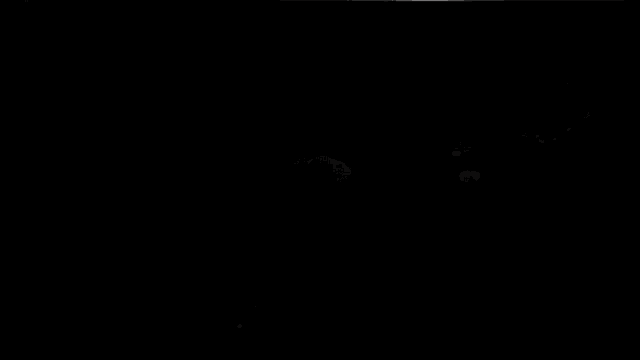 a black background with a lot of water splashing on it