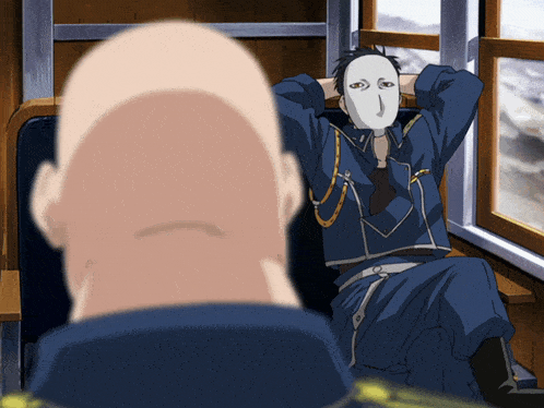 a man with a mask on his face sits on a bench with his hands behind his head