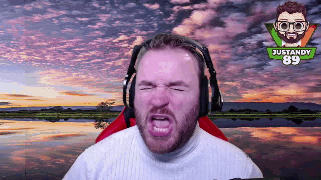 a man wearing headphones with justandy 89 on the bottom
