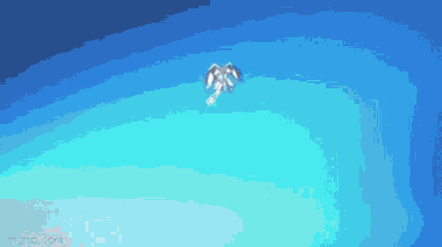 a kite is flying in the sky with a blue background