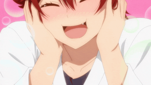 a girl with red hair is making a funny face with her hands on her face